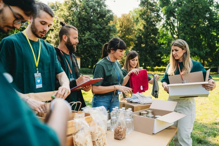 Volunteers packing meals for a food charity